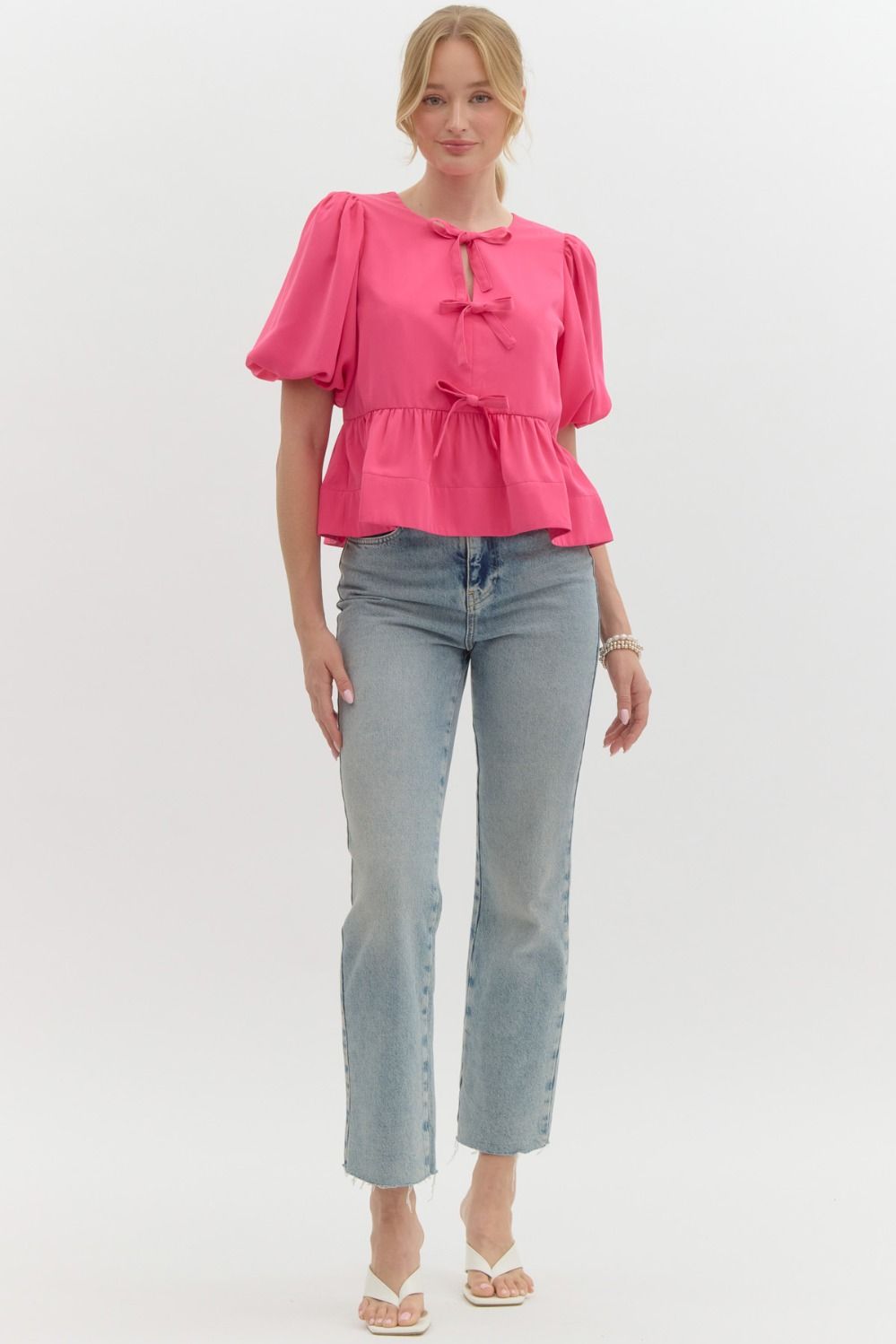 Three Bow Peplum Top