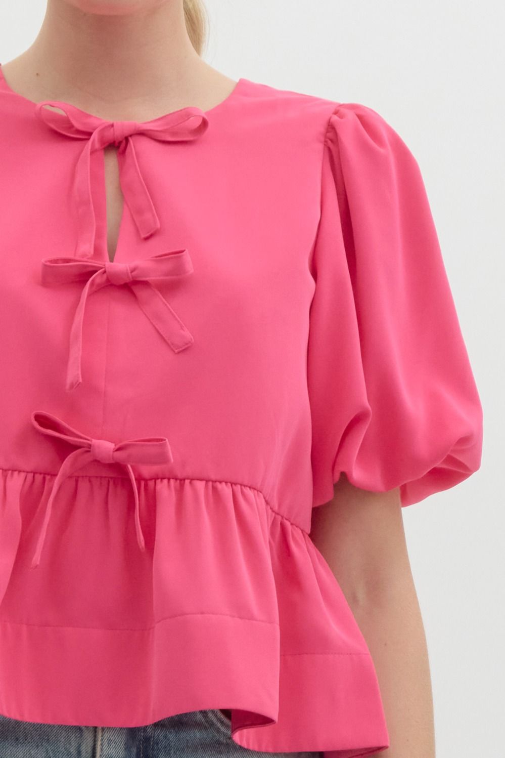 Three Bow Peplum Top